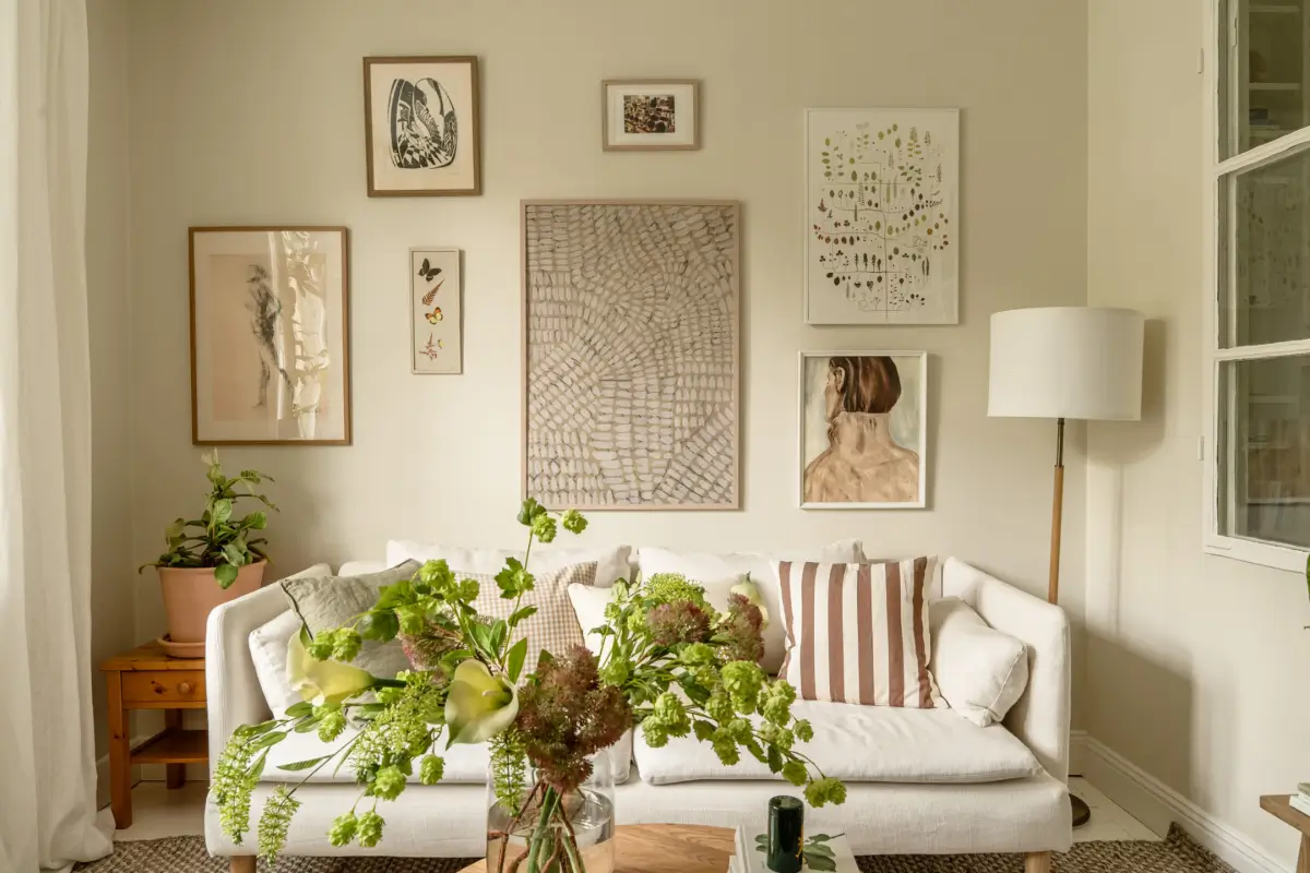 A Dividing Wall with Flea Market Windows Creates a Cozy Sleeping Niche in this Apartment 5 light-filled-turn-of-the-century-apartment-stockholm-nordroom