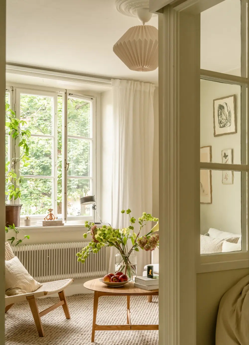 A Dividing Wall with Flea Market Windows Creates a Cozy Sleeping Niche in this Apartment 6 light-filled-turn-of-the-century-apartment-stockholm-nordroom