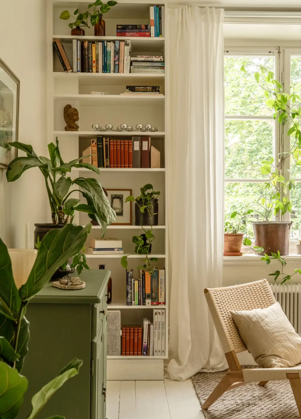A Dividing Wall with Flea Market Windows Creates a Cozy Sleeping Niche in this Apartment 10 light-filled-turn-of-the-century-apartment-stockholm-nordroom