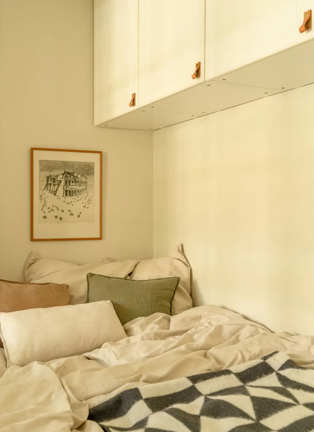 A Dividing Wall with Flea Market Windows Creates a Cozy Sleeping Niche in this Apartment 15 light-filled-turn-of-the-century-apartment-stockholm-nordroom