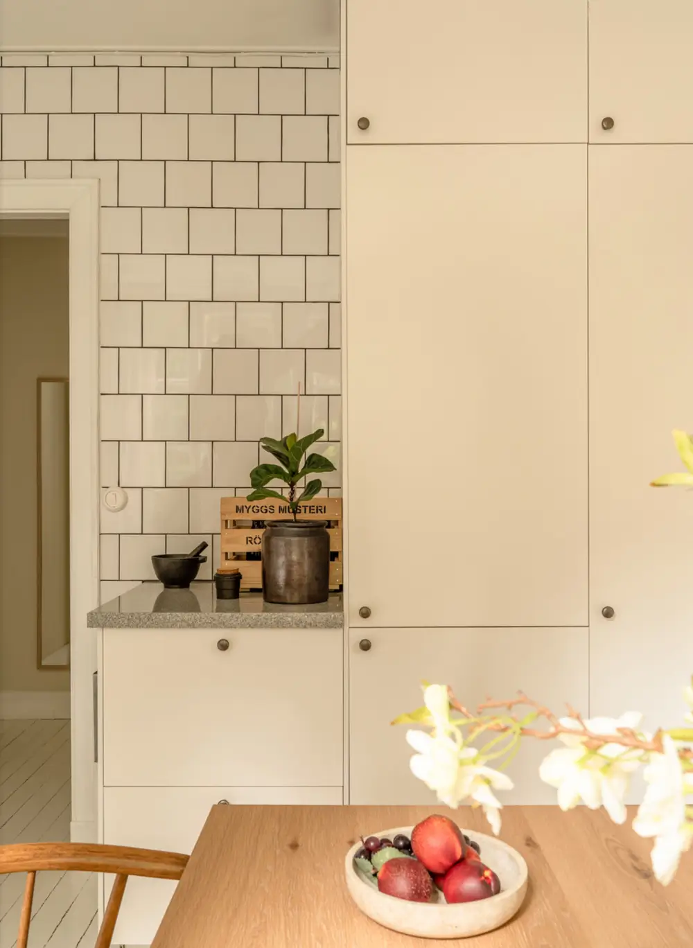 A Dividing Wall with Flea Market Windows Creates a Cozy Sleeping Niche in this Apartment 28 light-filled-turn-of-the-century-apartment-stockholm-nordroom