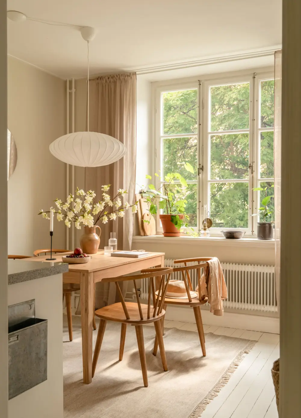A Dividing Wall with Flea Market Windows Creates a Cozy Sleeping Niche in this Apartment 22 light-filled-turn-of-the-century-apartment-stockholm-nordroom