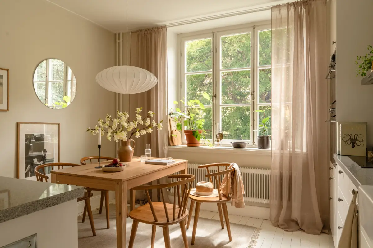 A Dividing Wall with Flea Market Windows Creates a Cozy Sleeping Niche in this Apartment 21 light-filled-turn-of-the-century-apartment-stockholm-nordroom