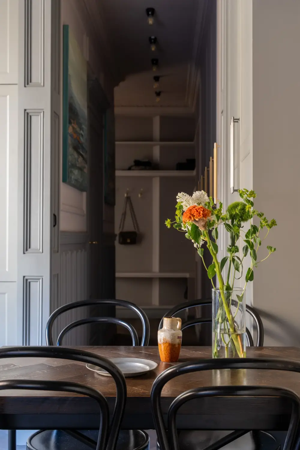A Small Dark Gray Stockholm Apartment with Period Features and Smart Storage 6 small-color-drenched-gray-apartment-stockholm