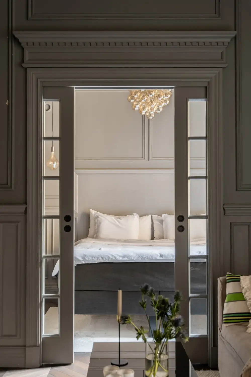 A Small Dark Gray Stockholm Apartment with Period Features and Smart Storage 17 small-color-drenched-gray-apartment-stockholm