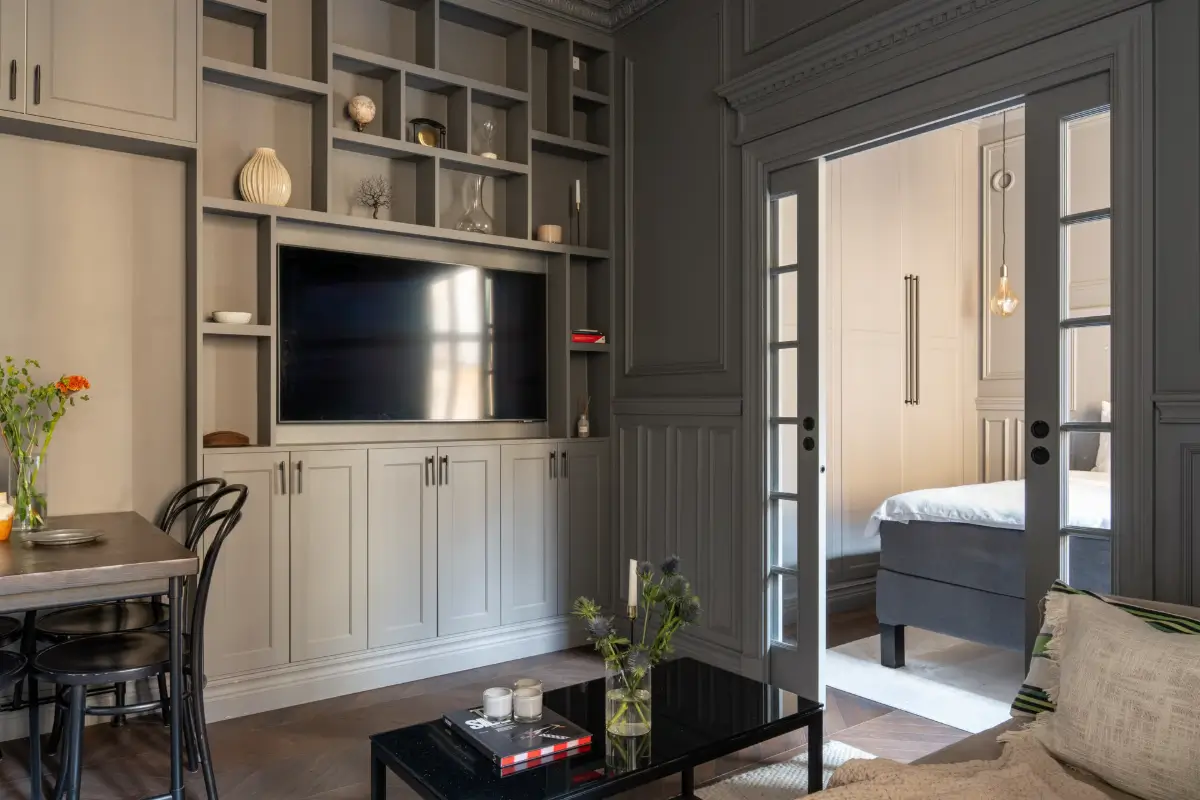 A Small Dark Gray Stockholm Apartment with Period Features and Smart Storage 3 small-color-drenched-gray-apartment-stockholm