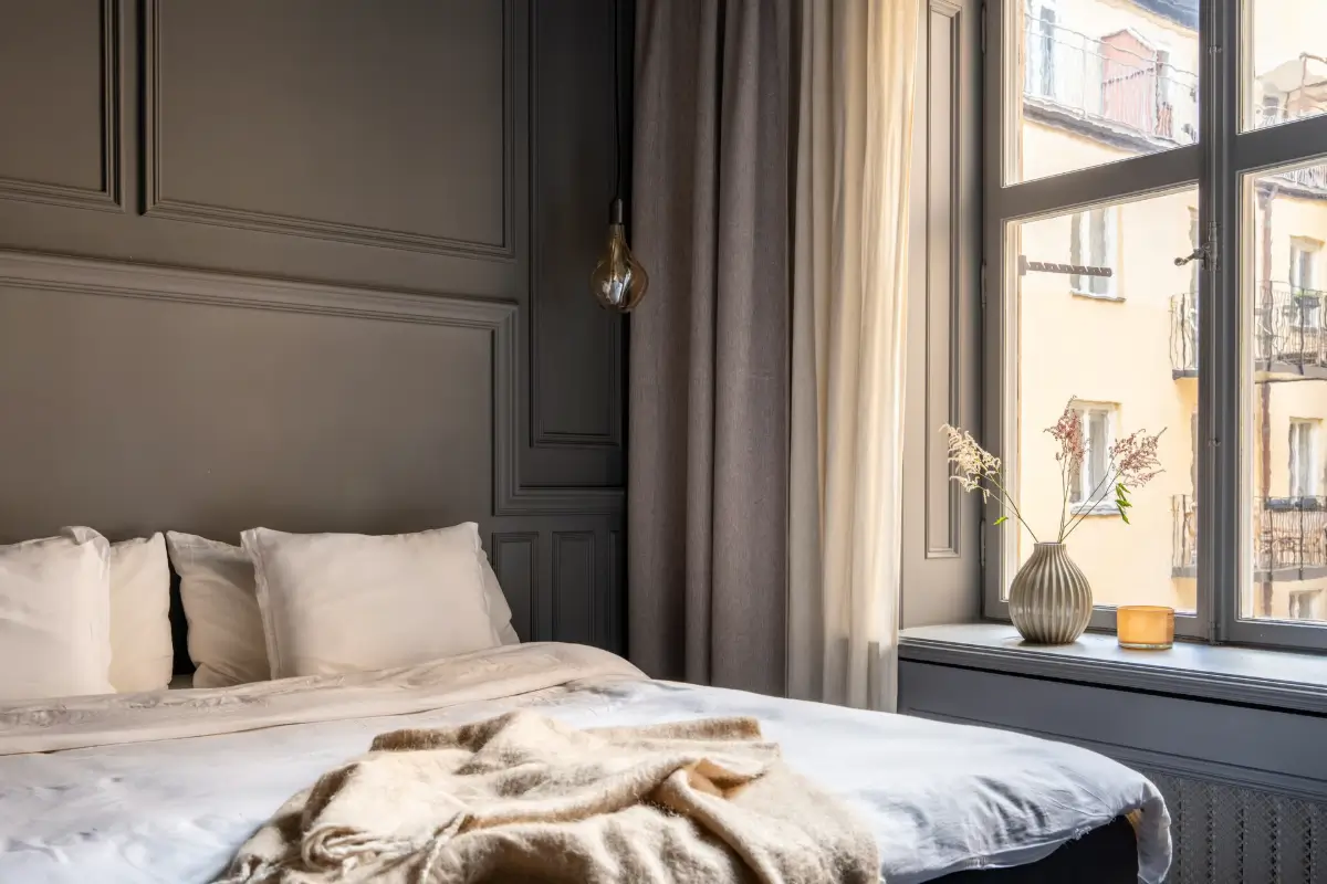 A Small Dark Gray Stockholm Apartment with Period Features and Smart Storage 19 small-color-drenched-gray-apartment-stockholm