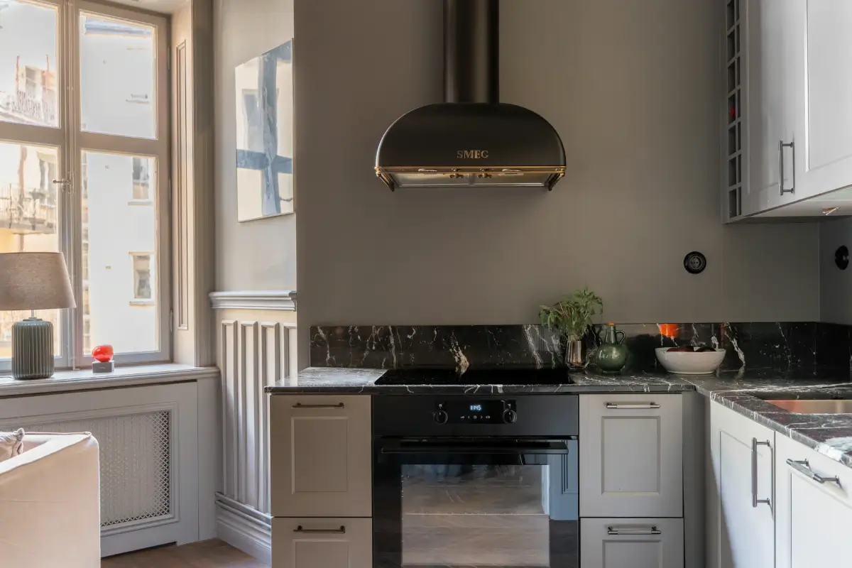 A Small Dark Gray Stockholm Apartment with Period Features and Smart Storage 8 small-color-drenched-gray-apartment-stockholm