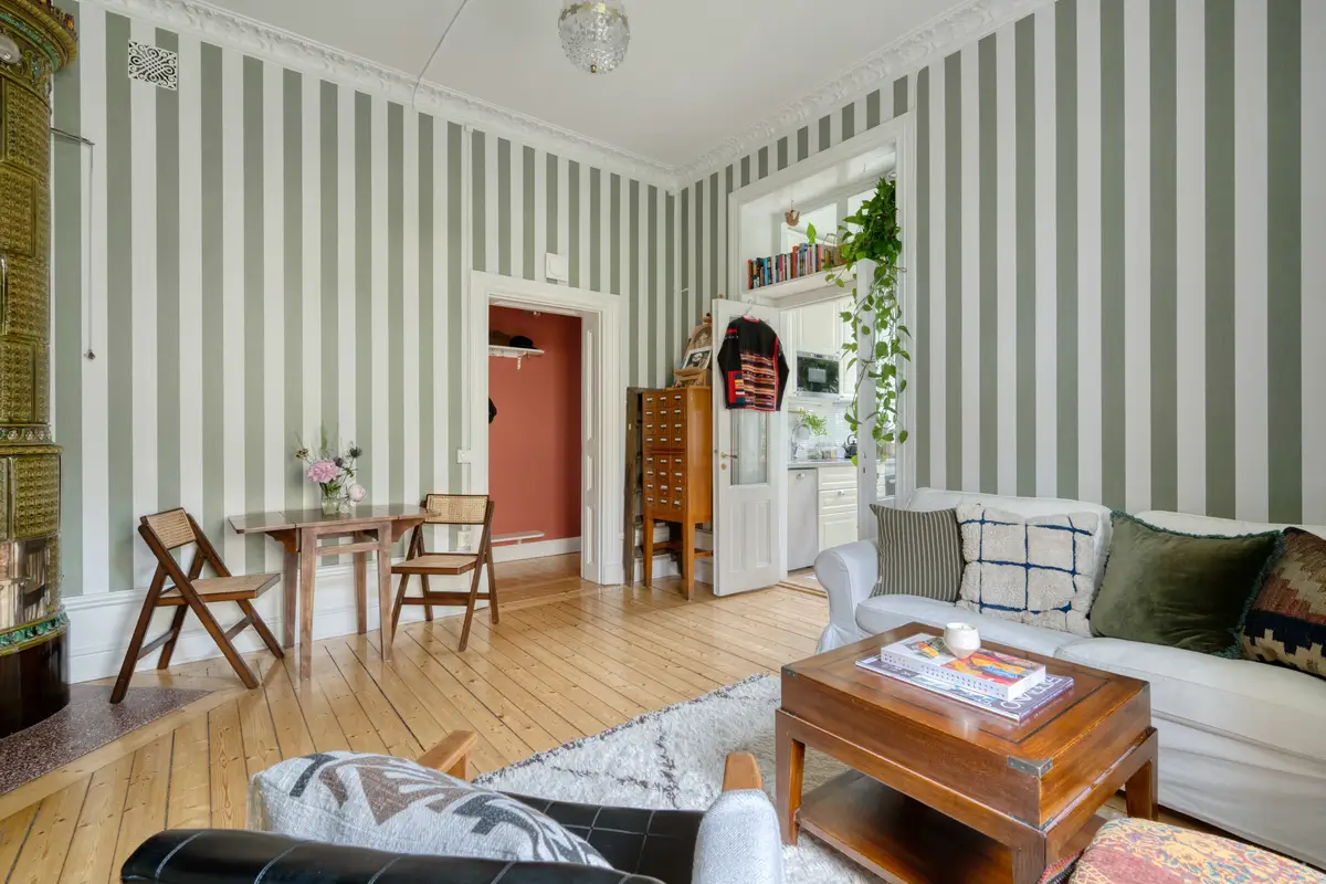 A Small Apartment with Striped Green Walls, Period Features, and a Yellow Bedroom 8 striped-green-walls-yellow-bedroom-late-19th-century-apartment-nordroom