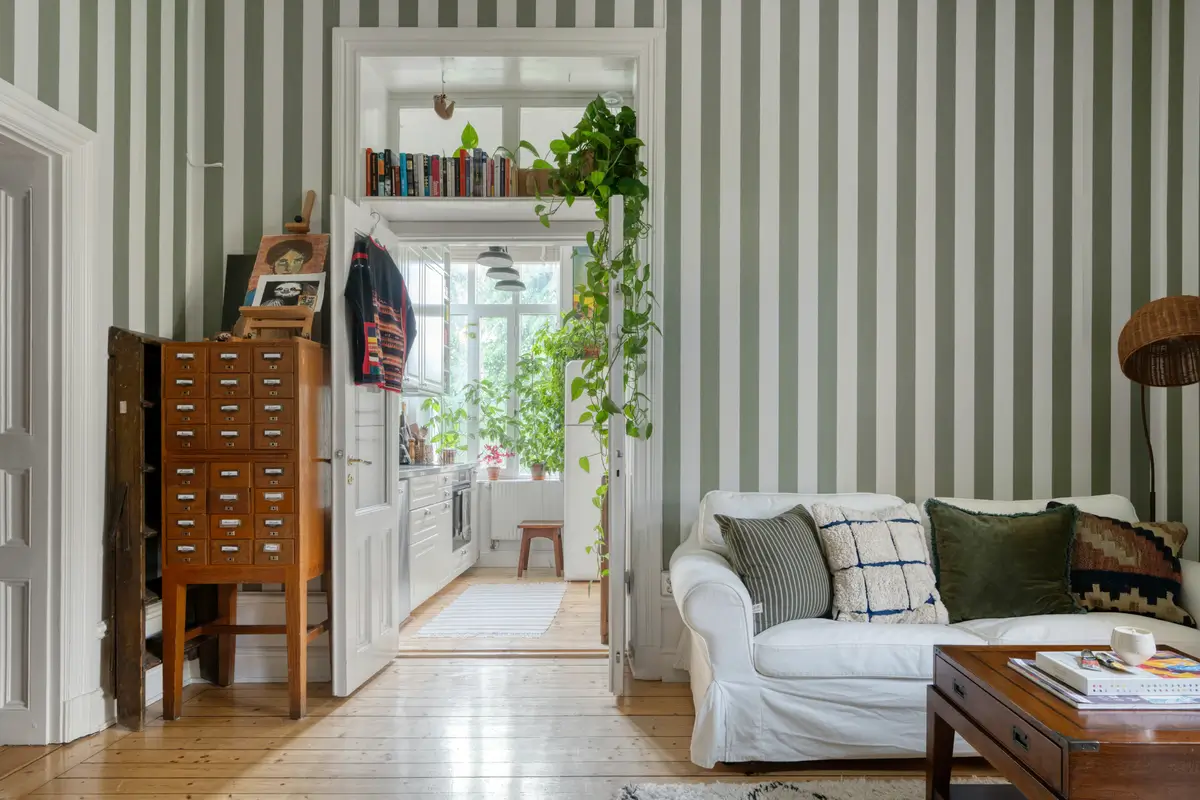 A Small Apartment with Striped Green Walls, Period Features, and a Yellow Bedroom 9 striped-green-walls-yellow-bedroom-late-19th-century-apartment-nordroom