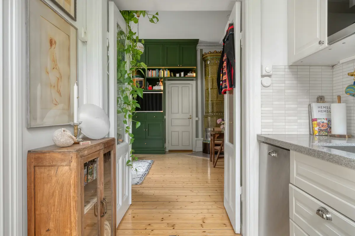 A Small Apartment with Striped Green Walls, Period Features, and a Yellow Bedroom 18 striped-green-walls-yellow-bedroom-late-19th-century-apartment-nordroom