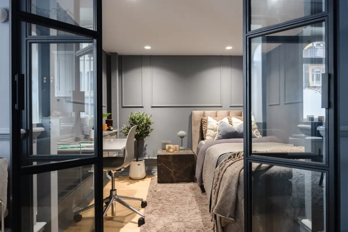 An Industrial Glass Wall Turns a Studio into a One-Bedroom Apartment 16 blue-studio-apartment-industrial-doors-loft-area-nordroom