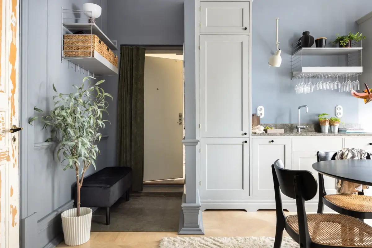An Industrial Glass Wall Turns a Studio into a One-Bedroom Apartment 24 blue-studio-apartment-industrial-doors-loft-area-nordroom