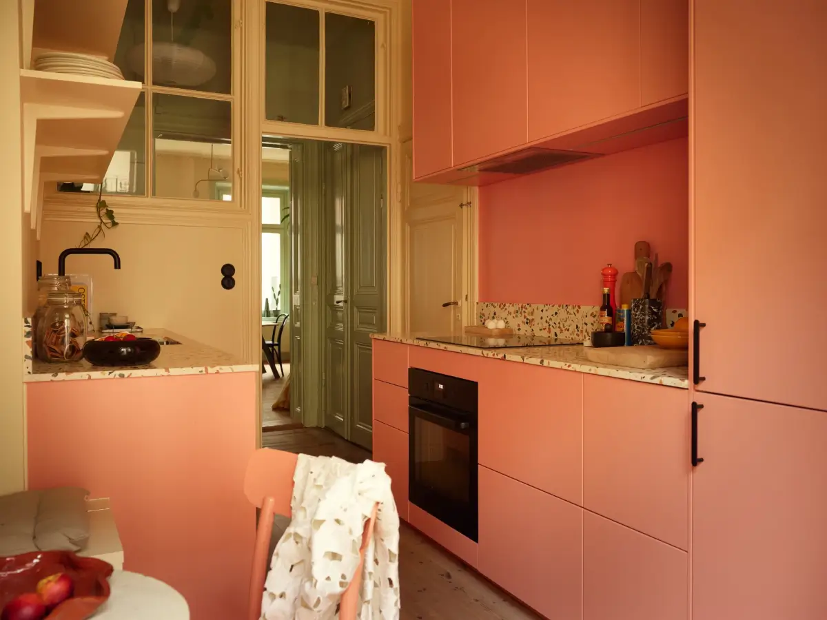 Before & After: A Colorful, Modern Update for a Late 19th-Century Apartment 30 pink-kitchen-painted-green-joinery-late-19th-century-stockholm-apartment-nordroom