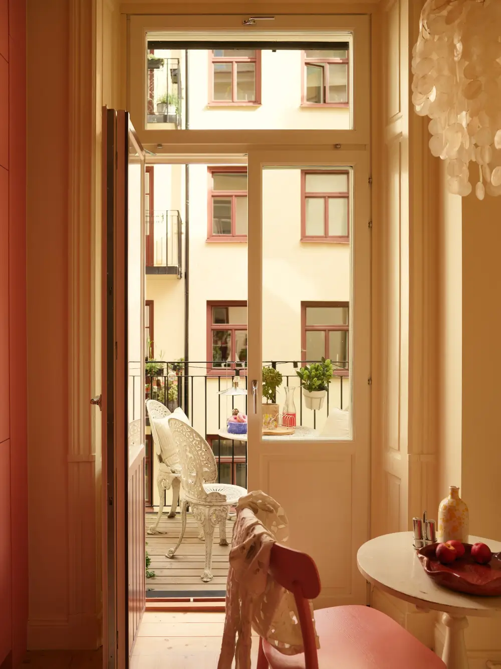 Before & After: A Colorful, Modern Update for a Late 19th-Century Apartment 27 pink-kitchen-painted-green-joinery-late-19th-century-stockholm-apartment-nordroom
