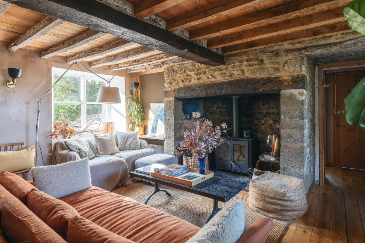 Pink Plaster Walls and Original Elements in a Renovated 18th-Century Thatched Cottage