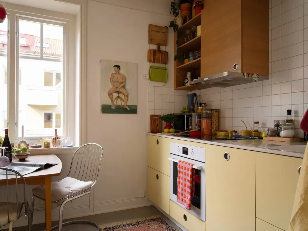 A Small Stockholm Corner Apartment Updated with a Butter-Yellow Kitchen 22 small-corner-apartment-yellow-kitchen-nordroom