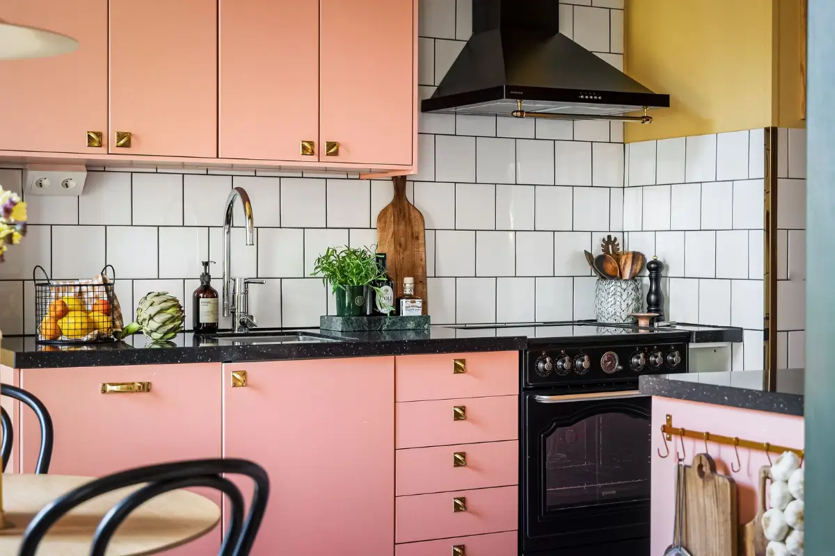 A Pink and Yellow Kitchen in a Colorful Turn-of-the-Century Studio Apartment 15 stockholm-studio-apartment-pink-yellow-kitchen-nordroom