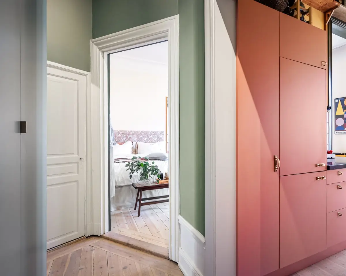 A Pink and Yellow Kitchen in a Colorful Turn-of-the-Century Studio Apartment 16 stockholm-studio-apartment-pink-yellow-kitchen-nordroom