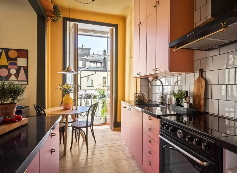 stockholm-studio-apartment-pink-yellow-kitchen-nordroom