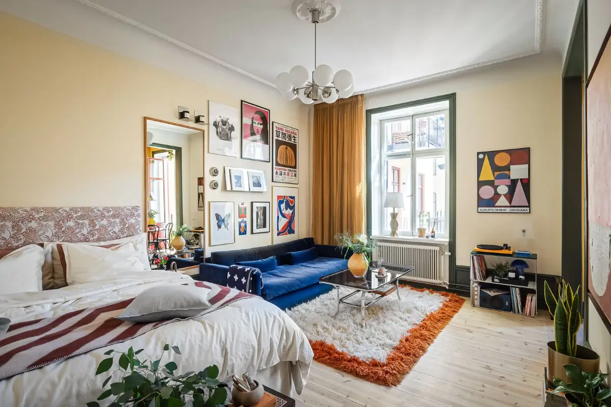 A Pink and Yellow Kitchen in a Colorful Turn-of-the-Century Studio Apartment 2 stockholm-studio-apartment-pink-yellow-kitchen-nordroom