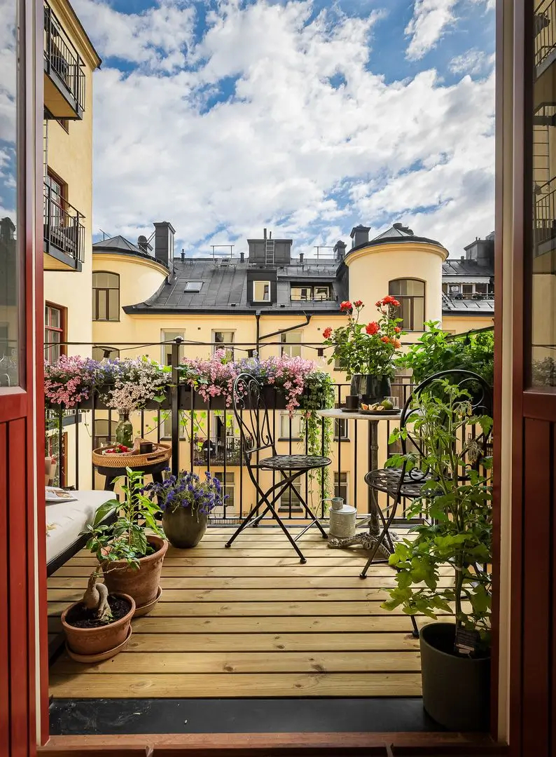 A Pink and Yellow Kitchen in a Colorful Turn-of-the-Century Studio Apartment 12 stockholm-studio-apartment-pink-yellow-kitchen-nordroom