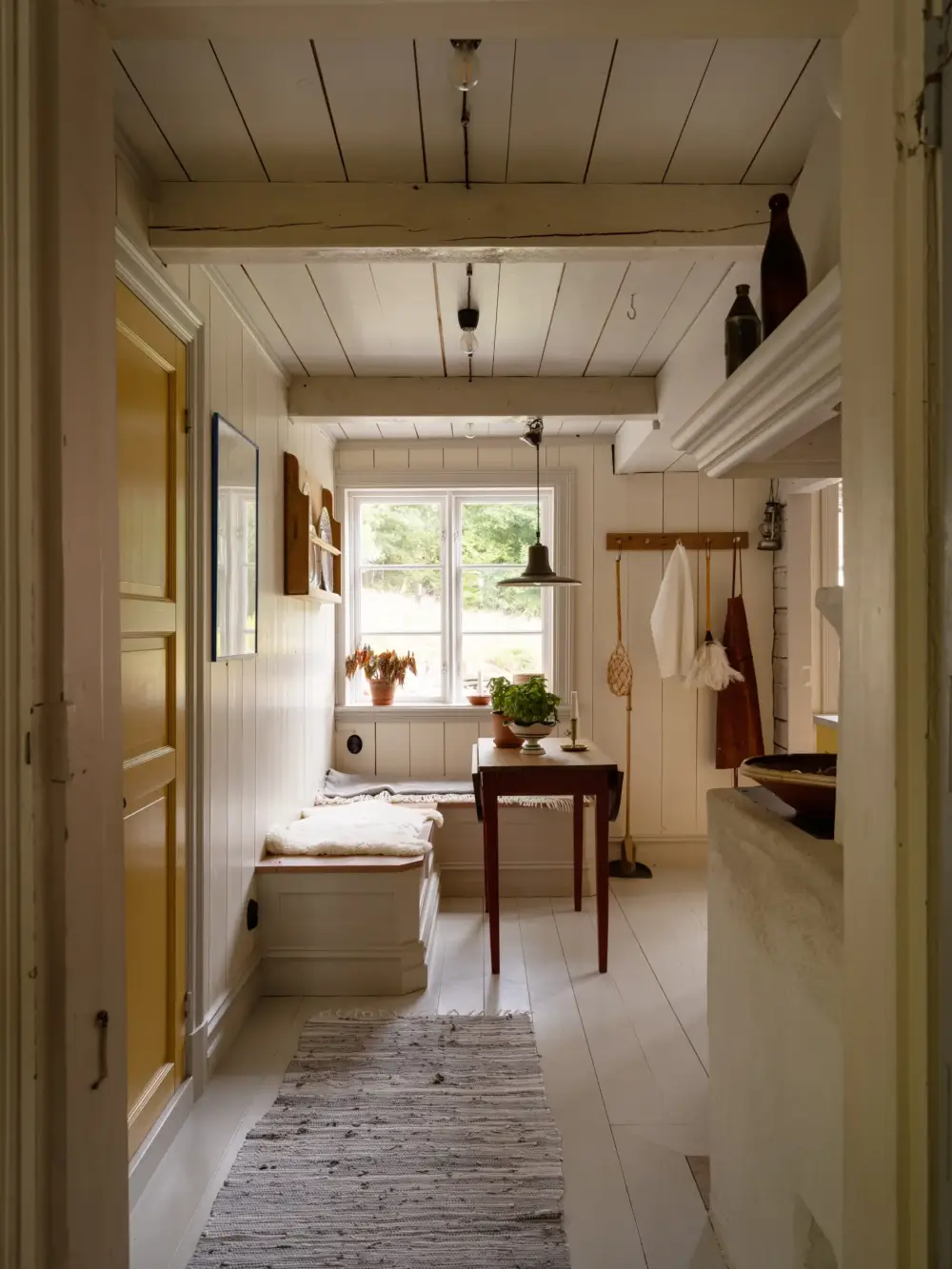 A Yellow Kitchen and Colorful Joinery in a Carefully Restored 1856 Swedish Country House 20 yellow-kitchen-historic-character-renovated-19th-century-home-sweden