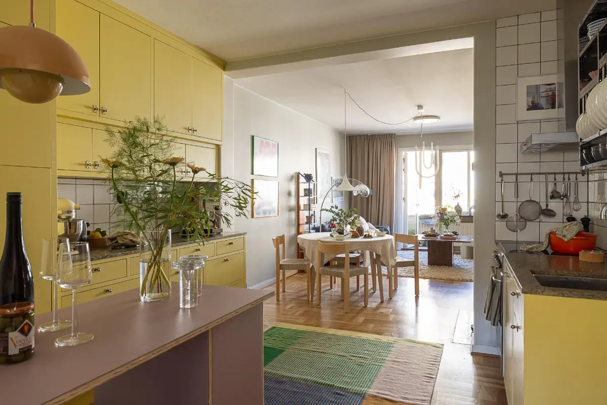 Original Features in a Colorful Midcentury Apartment in Sweden 9 yellow-kitchen-original-features-1940s-apartment-nordroom
