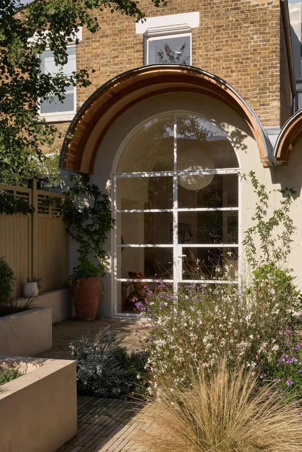 Arched Shapes, Period Details, and Color for a Victorian Family Home 22 arched-forms-light-filled-extended-19th-century-home-london