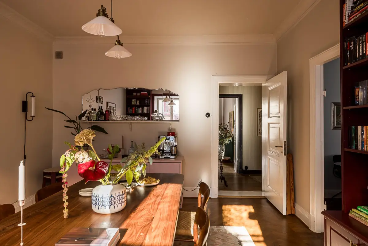Before & After: A Warm Color Palette and Built-In Bookshelves for a Swedish Home 16 before-and-after-warm-cohesive-color-palette-renovated-turn-of-the-century-apartment-nordroom