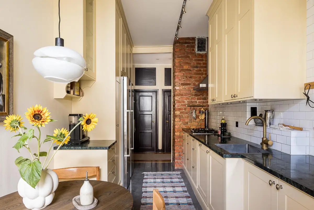 Before & After: A Warm Color Palette and Built-In Bookshelves for a Swedish Home 26 before-and-after-warm-cohesive-color-palette-renovated-turn-of-the-century-apartment-nordroom
