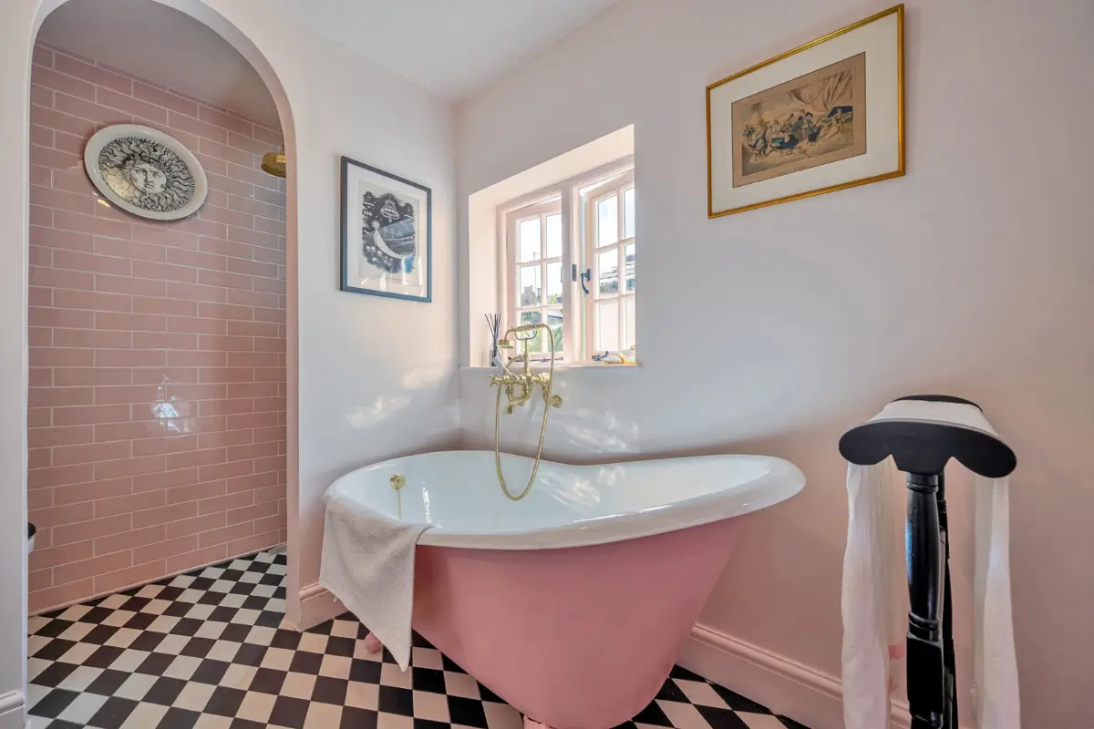 A London Family Home with a Pink deVOL Kitchen and Mint-Green Floorboards 14 freestanding-pink-bath-checkered-floor-shower-niche