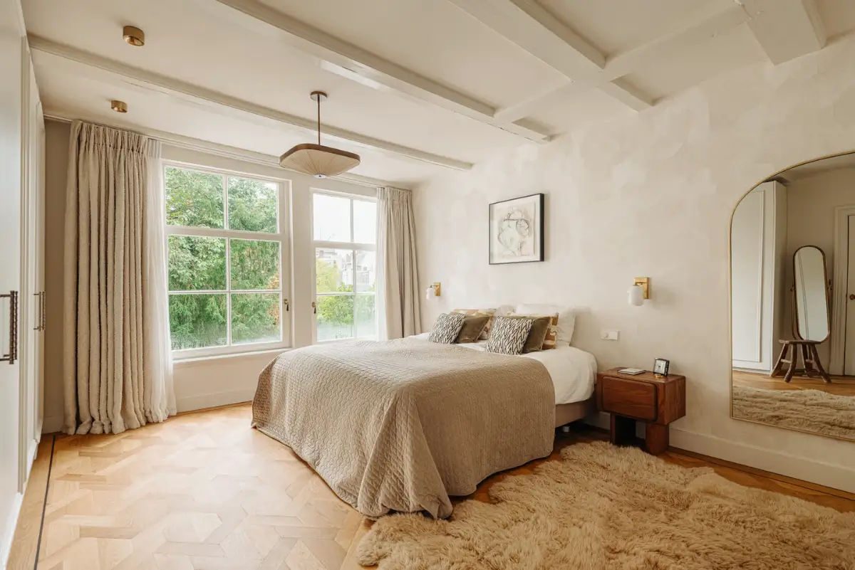 A Classic Amsterdam Canal House with a Light Blue Kitchen and a Secluded Garden 32 luxurious-canal-house-amsterdam
