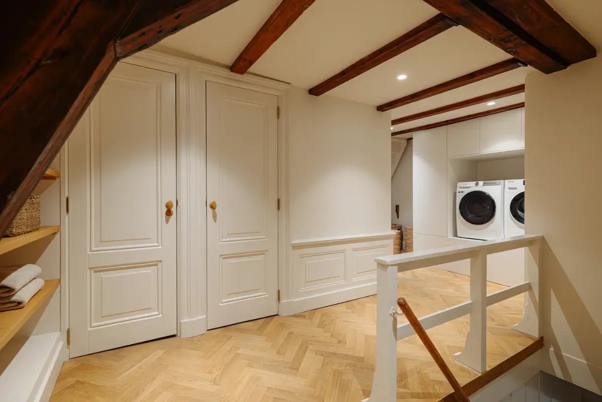 A Classic Amsterdam Canal House with a Light Blue Kitchen and a Secluded Garden 40 luxurious-canal-house-amsterdam