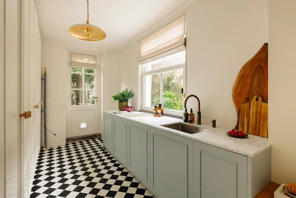 A Classic Amsterdam Canal House with a Light Blue Kitchen and a Secluded Garden 18 luxurious-canal-house-amsterdam