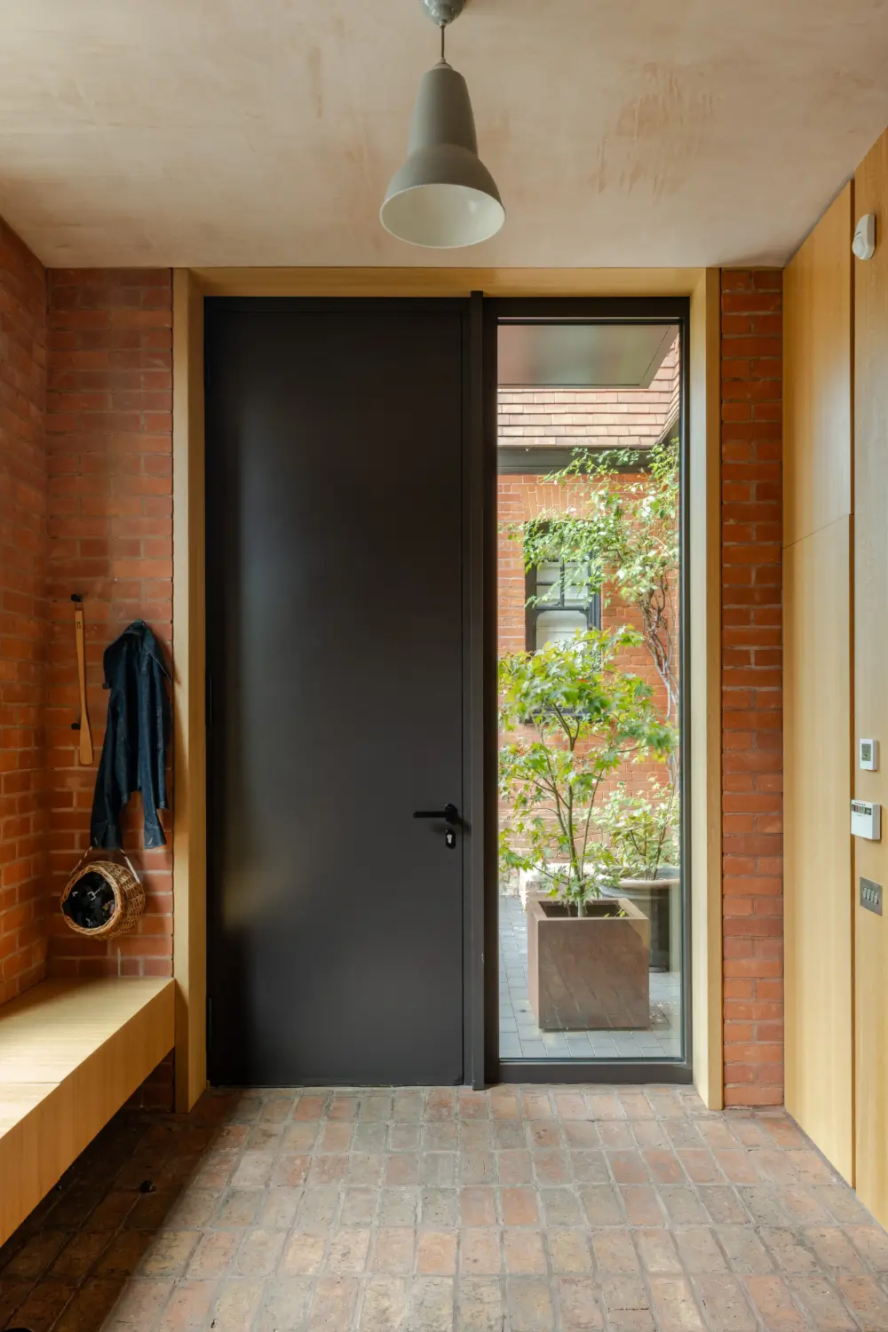 A Douglas Fir Extension Wraps Around an Arts and Crafts House in Petersfield 2 reimagined-arts-crafts-house-england
