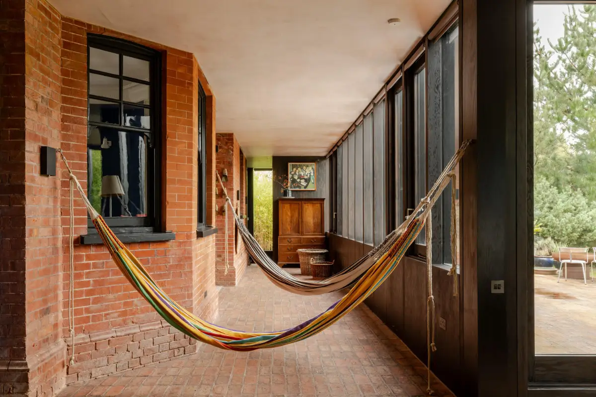 A Douglas Fir Extension Wraps Around an Arts and Crafts House in Petersfield 14 reimagined-arts-crafts-house-england