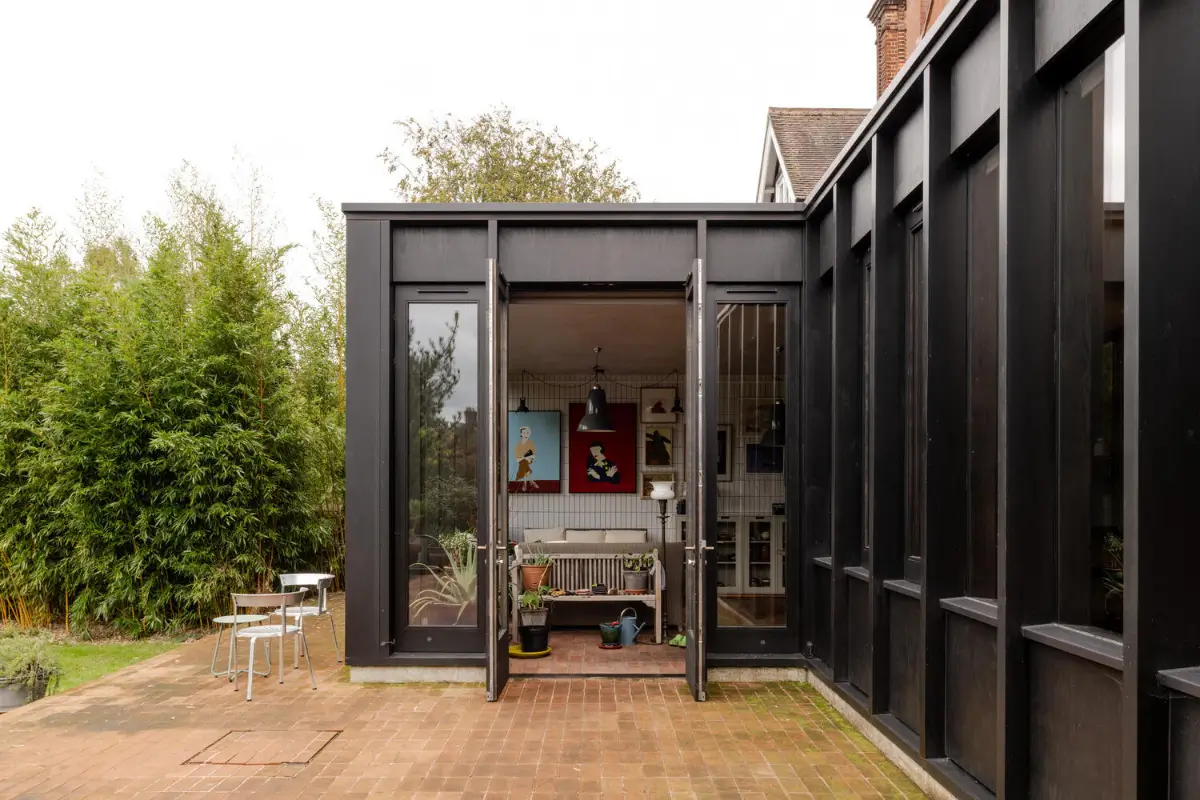 A Douglas Fir Extension Wraps Around an Arts and Crafts House in Petersfield 27 reimagined-arts-crafts-house-england
