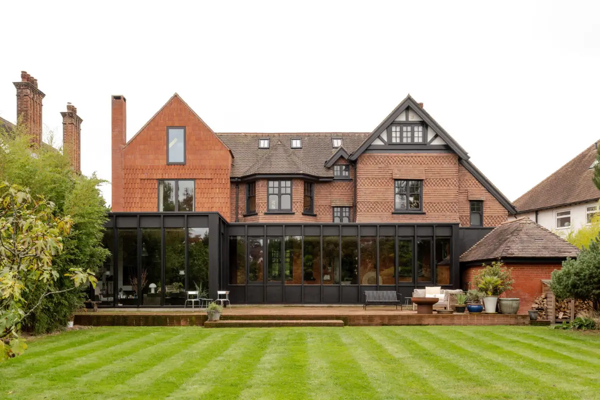 A Douglas Fir Extension Wraps Around an Arts and Crafts House in Petersfield 28 reimagined-arts-crafts-house-england