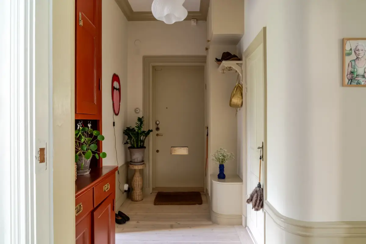 A Serene Palette with Red Pop of Color in an Early 20th-Century Apartment 39 soft-color-palette-red-accents-1912-apartment-stockholm